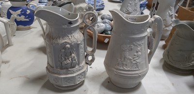 Lot 42 - Six relief-moulded jugs
