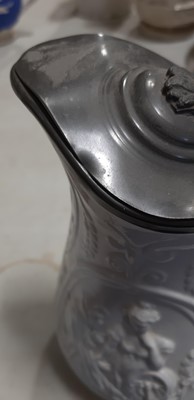 Lot 42 - Six relief-moulded jugs