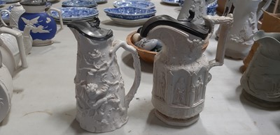 Lot 42 - Six relief-moulded jugs