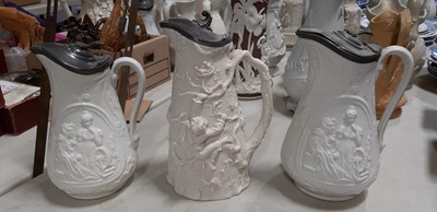 Lot 42 - Six relief-moulded jugs