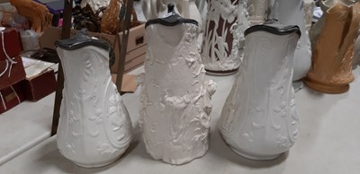 Lot 42 - Six relief-moulded jugs