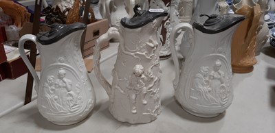 Lot 42 - Six relief-moulded jugs