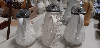Lot 42 - Six relief-moulded jugs