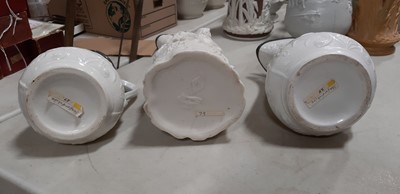 Lot 42 - Six relief-moulded jugs
