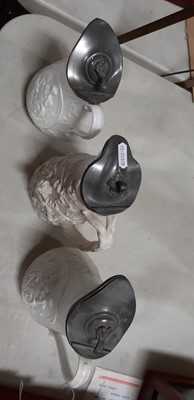 Lot 42 - Six relief-moulded jugs