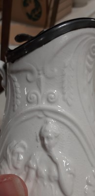Lot 42 - Six relief-moulded jugs