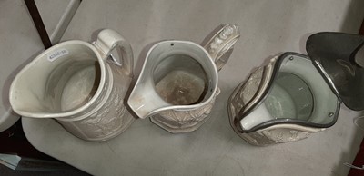 Lot 42 - Six relief-moulded jugs