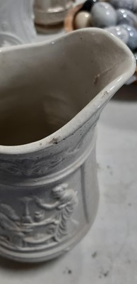 Lot 42 - Six relief-moulded jugs