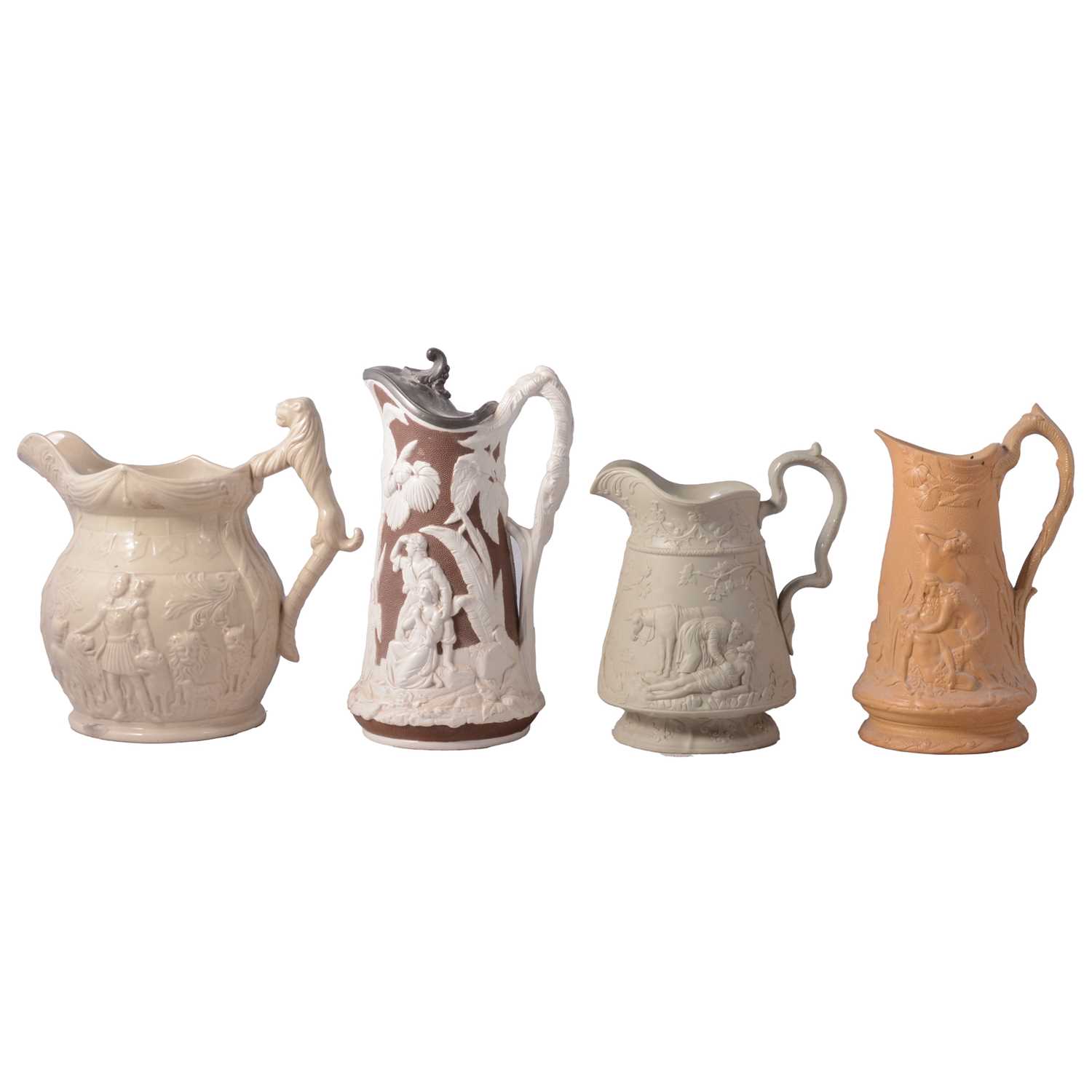Lot 43 - Six relief-moulded jugs