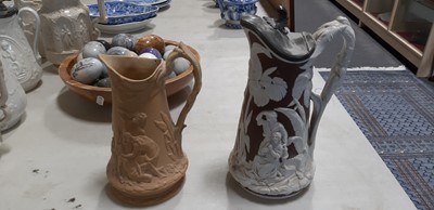 Lot 43 - Six relief-moulded jugs