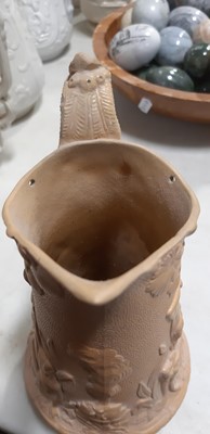 Lot 43 - Six relief-moulded jugs