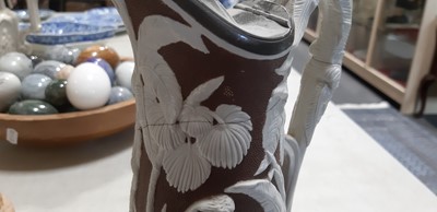 Lot 43 - Six relief-moulded jugs