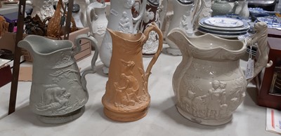 Lot 43 - Six relief-moulded jugs