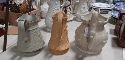 Lot 43 - Six relief-moulded jugs