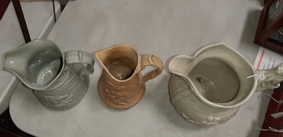 Lot 43 - Six relief-moulded jugs