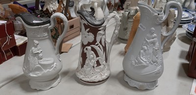 Lot 43 - Six relief-moulded jugs