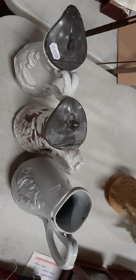 Lot 43 - Six relief-moulded jugs