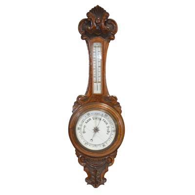 Lot 448 - Edwardian oak barometer with thermometer