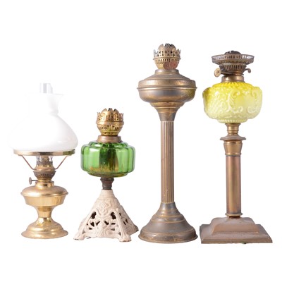 Lot 398 - Four assorted oil lamp bases, and four assorted shades