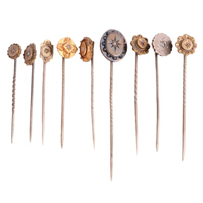 Lot 354 - Ten diamond / diamond chip stick pins.