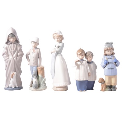 Lot 128 - Eight Nao figurines and one Lladro figurine.
