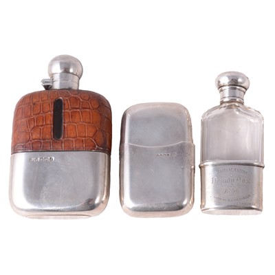 Lot 306 - Two silver-mounted hip flasks, and a silver cigarette case
