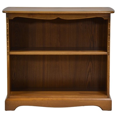 Lot 344 - Ercol elm open bookcase