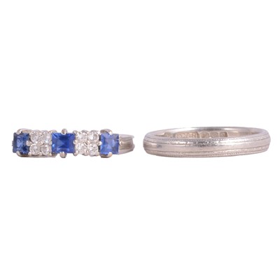 Lot 41 - A sapphire and diamond half eternity ring and platinum wedding ring.