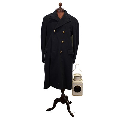 Lot 200 - British Railways train tail lamp; and a greatcoat.
