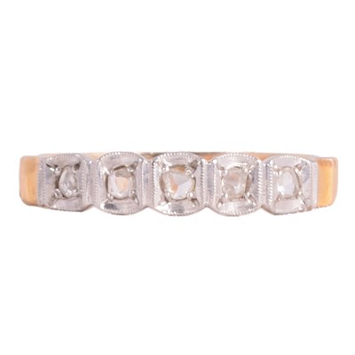 Lot 108 - An unusual diamond eternity ring.