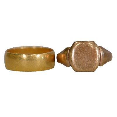 Lot 294A - A 22 carat gold wedding band, and a 9 carat yellow gold signet ring.