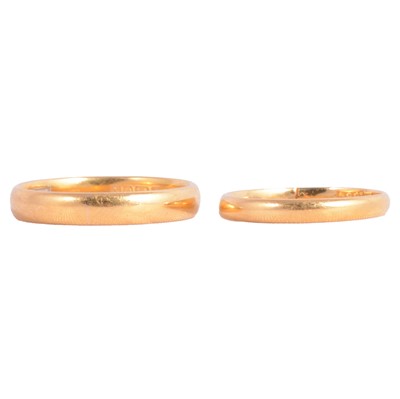 Lot 134 - Two 22 carat yellow gold wedding bands.