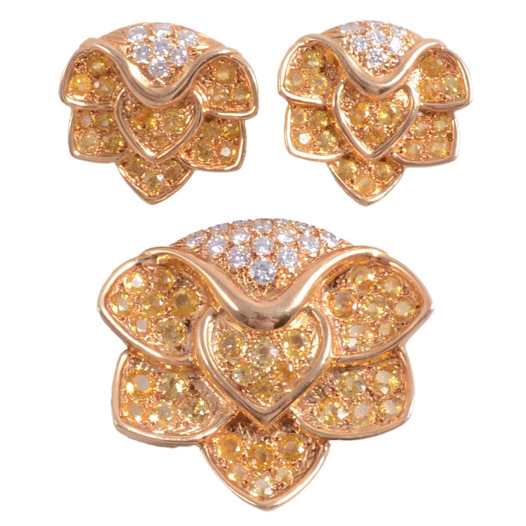 217 - Rene Boivin - a signed suite of 18 carat yellow gold natural yellow sapphire and diamond jewellery.