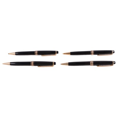Lot 387 - Montblanc - four retractable rollerball pens.