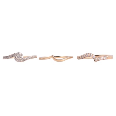 Lot 109 - Two diamond rings and a shaped gold band designed to fit together.
