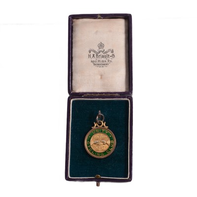 Lot 369 - A 9 carat yellow gold Unity Cycling Club medallion.