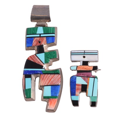 Lot 422 - Frank Yellowhorse for Navajo - a Native American gemset white metal pendant and pendant brooch.