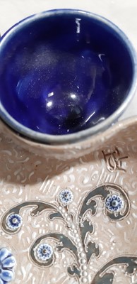 Lot 2 - George Tinworth for Doulton Lambeth, an unusual stoneware entree dish, 1886