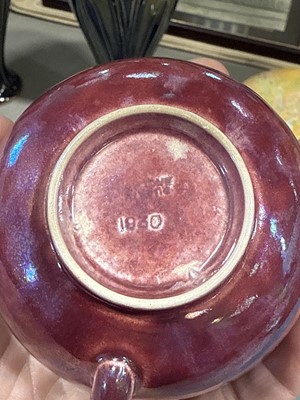 Lot 8 - Ruskin, two lustre cups and saucers, and a lustred bowl (attributed)