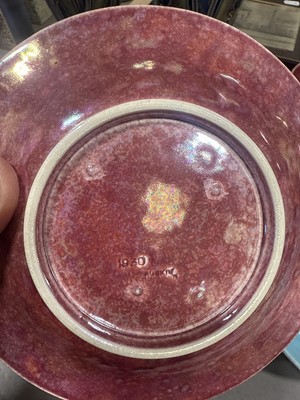 Lot 8 - Ruskin, two lustre cups and saucers, and a lustred bowl (attributed)