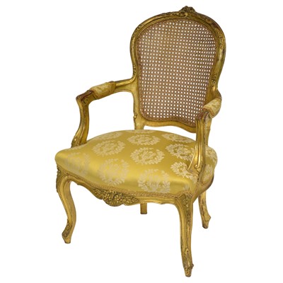 Lot 495 - Gilt-framed cane back elbow chair