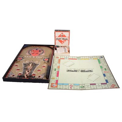 Lot 180 - Trik-E-Shot bagatelle board, and a 1930s Monopoly board game