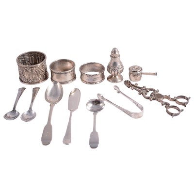 Lot 309 - Silver napkin rings, teaspoons, sugar nips, and other small silver items.