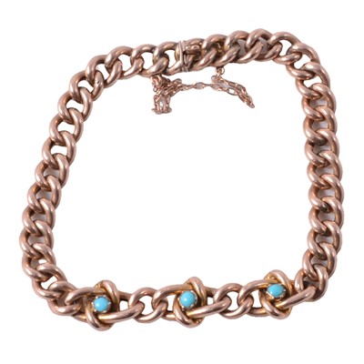 Lot 284 - A yellow metal and turquoise bracelet.