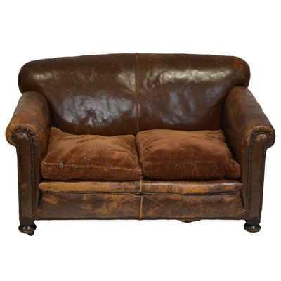 Lot 350 - Distressed leather effect sofa and pair of armchairs