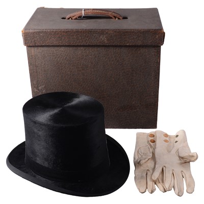Lot 152 - Black silk plush top hat, white kid gloves, white bow tie, and clothes brush, in fitted carry case.