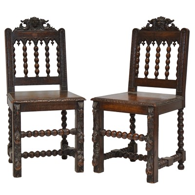 Lot 331 - Pair of Victorian carved oak hall chairs