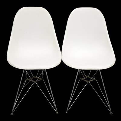 Lot 50 - Set of four white modern Eames style chairs and a marble top 'Tulip' table
