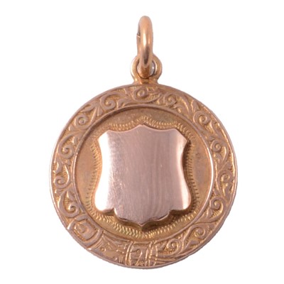Lot 362 - A 9 carat rose gold circular medallion.