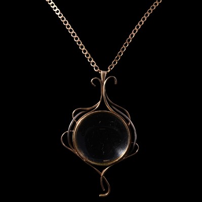 Lot 235 - A magnifying glass and chain.